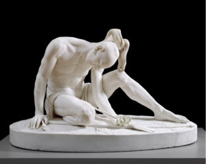 sculpture of a wounded indian