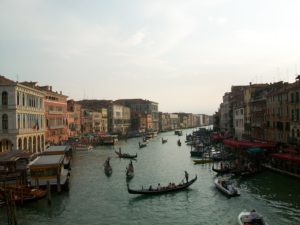 A Venetian canal with boats and buildings