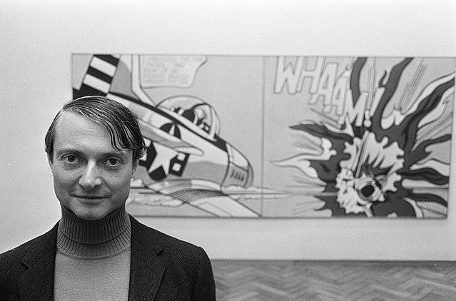 Roy Lichtenstein standing in front of his work Whaam! (photo courtesy of Eric Koch)