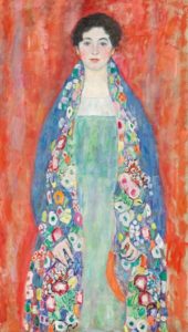 A three-quarters portrait of a young woman by Gustav Klimt