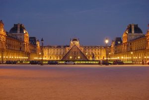Photograph of the Louvre at night